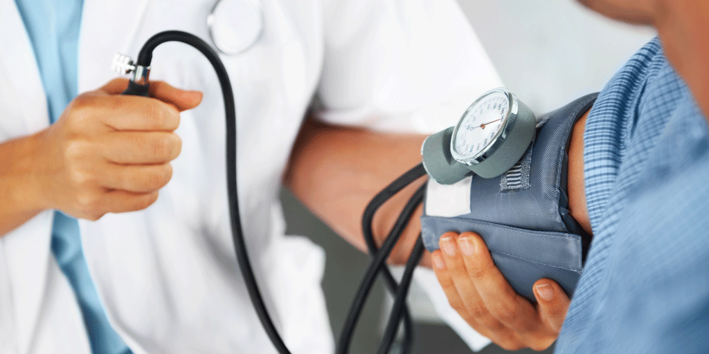Provider Checking Blood Pressure for Hypertension Management