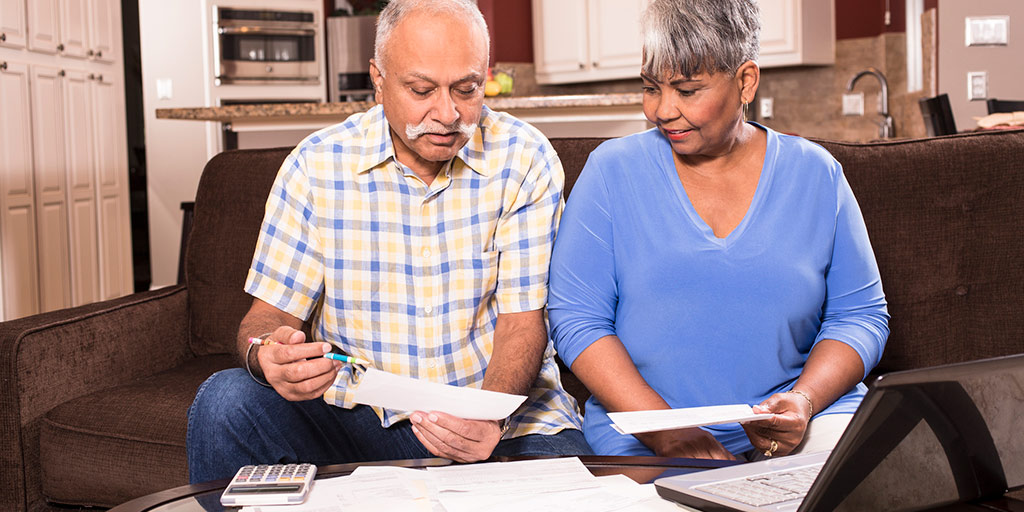 A couple working on their taxes.